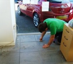 During Picture - Grout Colour changed on car showroom floor by Tile Doctor Lancaster