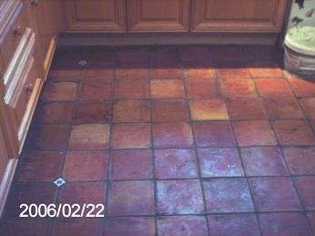 Mexican Terracotta floor before being cleaned and sealed by the Tile Doctor.