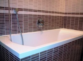 Tiled bath with Shower