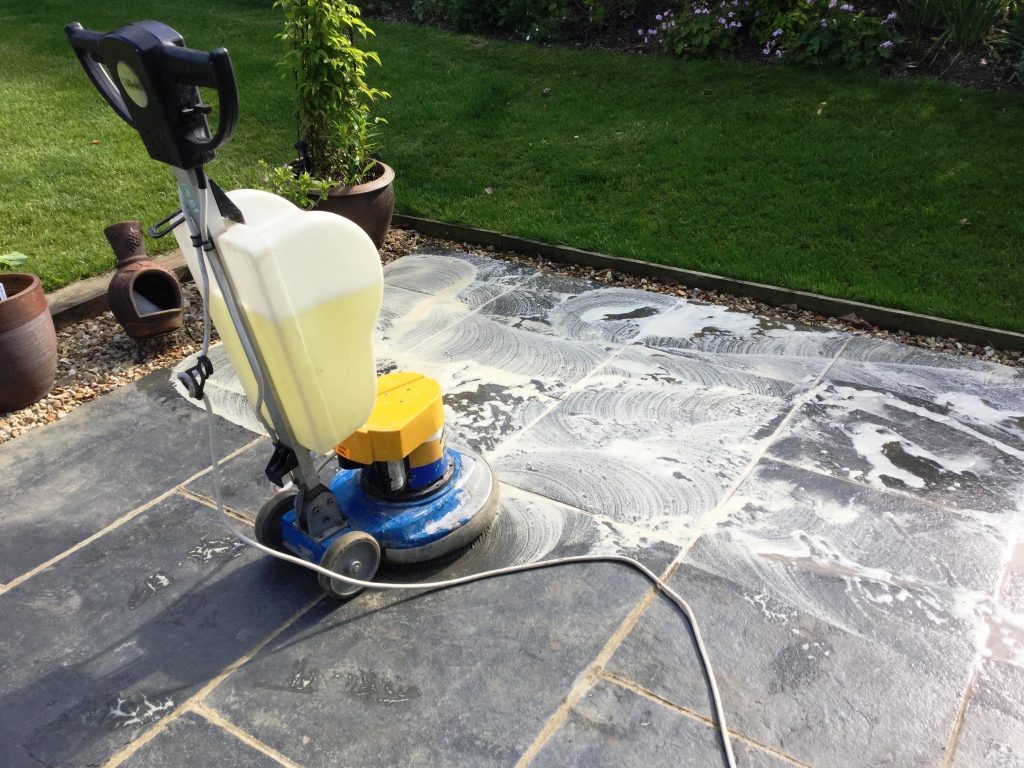 Black Limestone patio during cleaning in Walgrave
