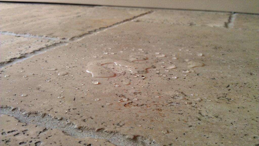 Water testing a sealed Travertine floor - photo courtesy of the Lincolnshire Tile Doctor