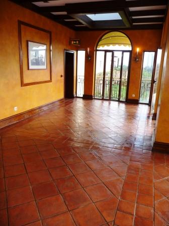 Terracotta restaurant floor after being cleaned and sealed by the Tile Doctor.